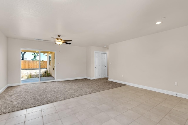 208 E Florence Ave, Fresno, CA 93706 - empty room featuring light colored carpet, baseboards, and ceiling fan