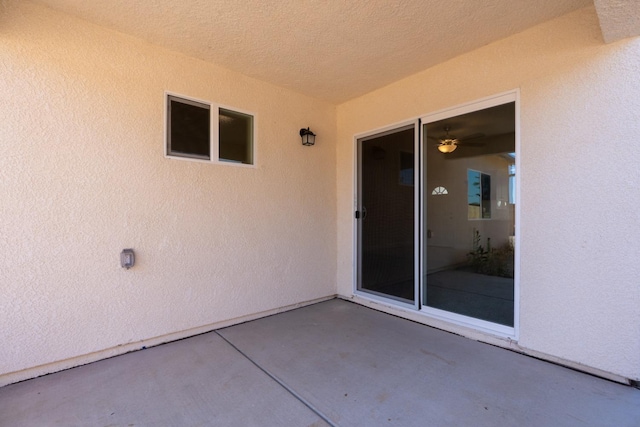 208 E Florence Ave, Fresno, CA 93706 - view of exterior entry with a patio area and stucco siding