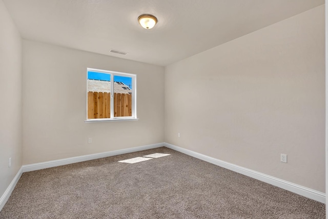 208 E Florence Ave, Fresno, CA 93706 - carpeted empty room featuring visible vents and baseboards