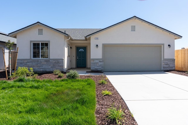 208 E Florence Ave, Fresno, CA 93706 - ranch-style house featuring stone siding, stucco siding, and fence