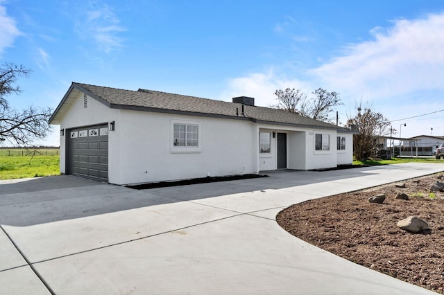 single story home featuring a garage