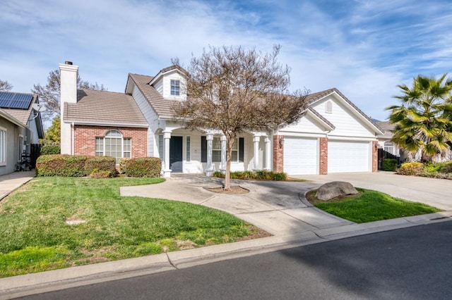 view of front of house featuring a garage and a front yard