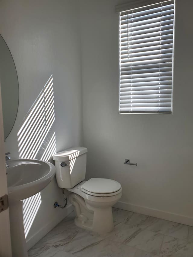 bathroom featuring toilet