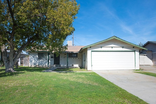 ranch-style home featuring a front yard and a garage