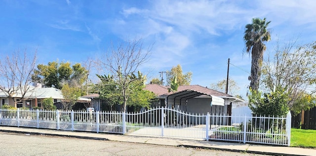 view of front of home with a carport