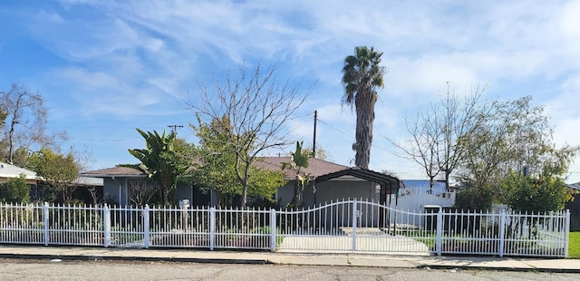 view of front of property with a carport