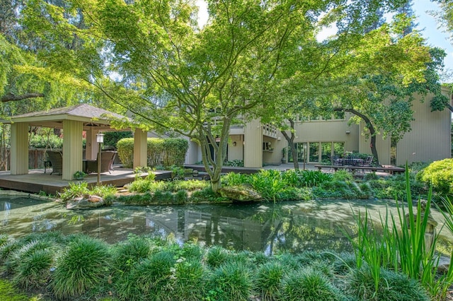 2352 W Loma Linda Ave, Fresno, CA 93711 - view of yard with a wooden deck, a gazebo, and a garden pond