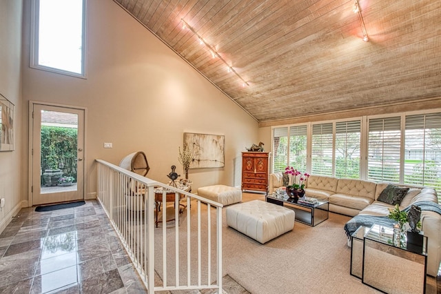 living room with high vaulted ceiling, track lighting, a wealth of natural light, and wooden ceiling