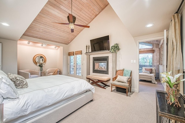 2352 W Loma Linda Ave, Fresno, CA 93711 - carpeted bedroom with lofted ceiling, a tile fireplace, wooden ceiling, and multiple windows