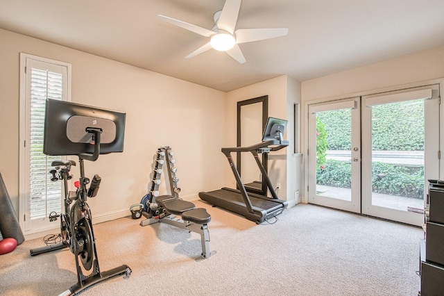 exercise area with ceiling fan, carpet floors, french doors, and a healthy amount of sunlight