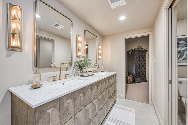 2352 W Loma Linda Ave, Fresno, CA 93711 - full bath with visible vents, toilet, and a sink