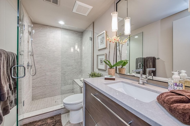 2352 W Loma Linda Ave, Fresno, CA 93711 - full bath with tile patterned flooring, visible vents, toilet, vanity, and a stall shower