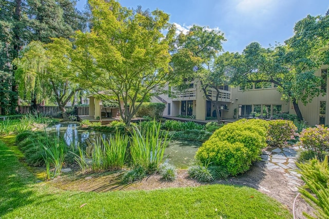 2352 W Loma Linda Ave, Fresno, CA 93711 - exterior space featuring a garden pond and fence