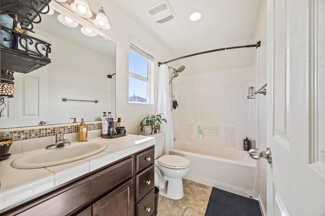 full bathroom featuring backsplash, vanity, shower / bathtub combination with curtain, tile patterned flooring, and toilet