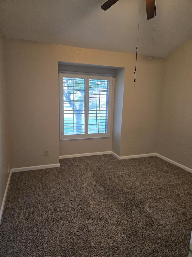 carpeted empty room with ceiling fan