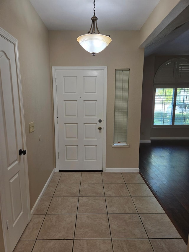 view of tiled foyer entrance