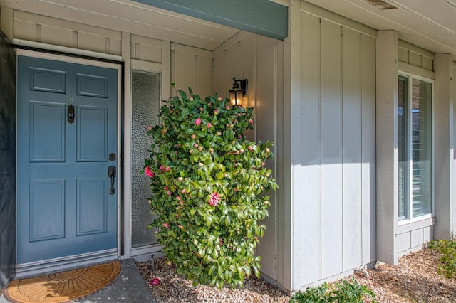 1058 W Browning Ave Unit B, Fresno, CA 93711 - view of exterior entry featuring board and batten siding