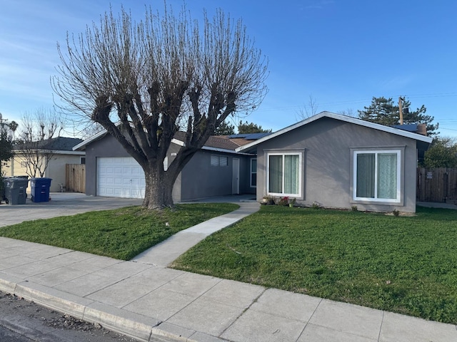 ranch-style home with a front lawn and a garage