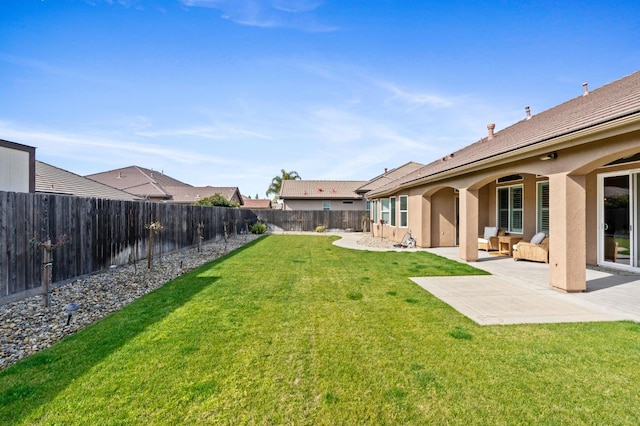 view of yard with a patio area