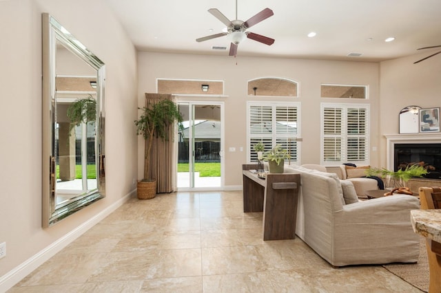 living room with ceiling fan