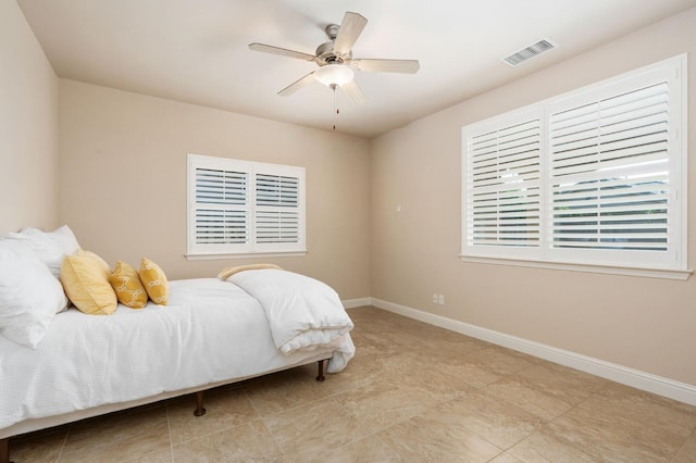 bedroom featuring ceiling fan