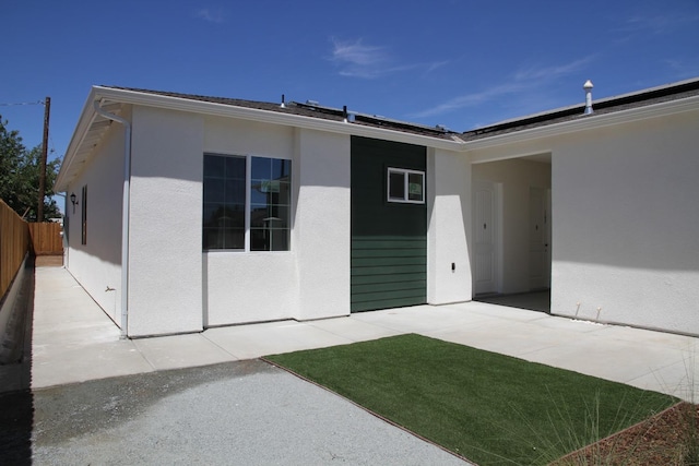 rear view of property with a patio