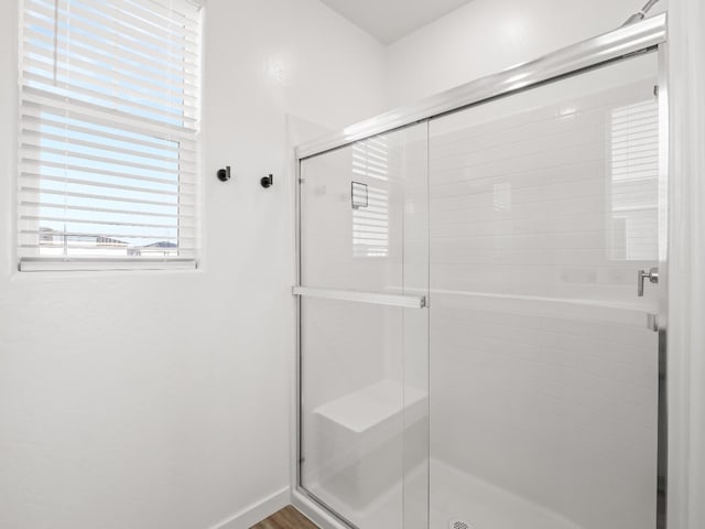 bathroom featuring walk in shower