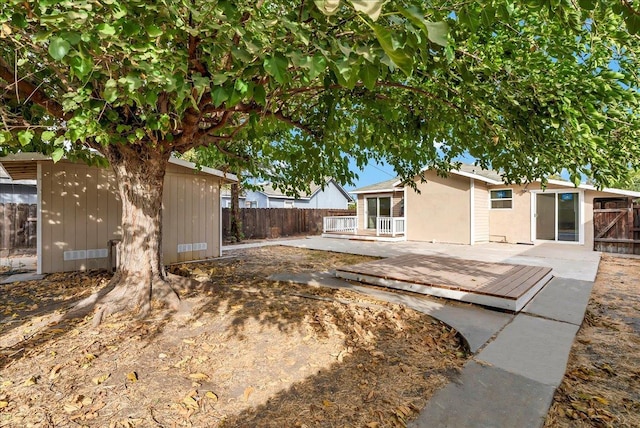 view of yard featuring a deck