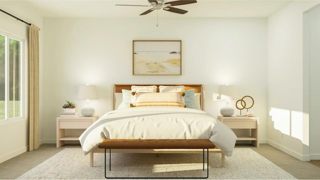 carpeted bedroom featuring multiple windows, baseboards, and a ceiling fan