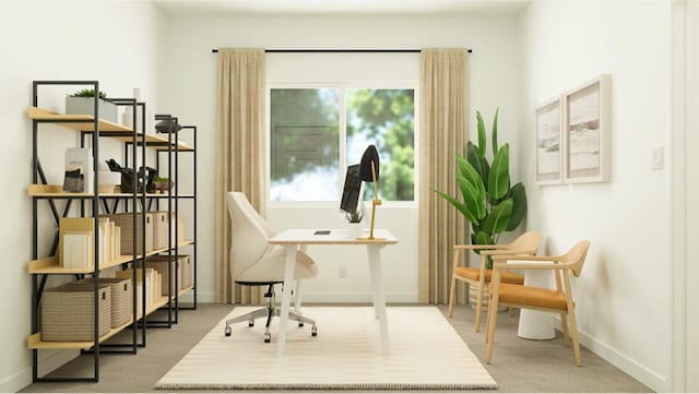sitting room featuring carpet and baseboards