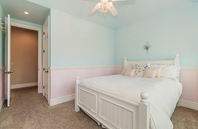 bedroom featuring light carpet, recessed lighting, a ceiling fan, and baseboards