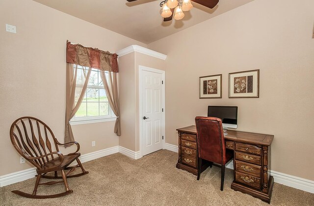 office space with baseboards, ceiling fan, and light colored carpet