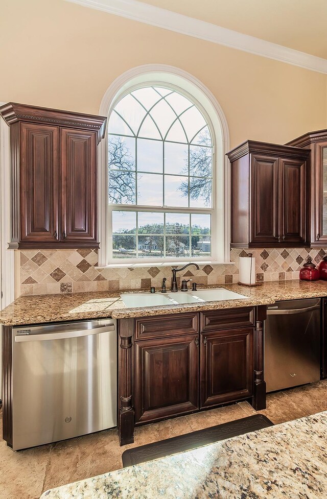 14505 Blue Drake Ln, Prather, CA 93651 - kitchen featuring dishwasher, a sink, dark brown cabinets, crown molding, and tasteful backsplash