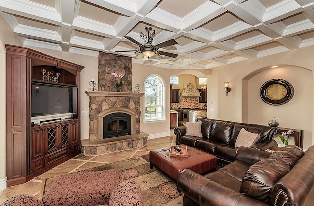 14505 Blue Drake Ln, Prather, CA 93651 - living room with a ceiling fan, coffered ceiling, ornamental molding, beamed ceiling, and arched walkways