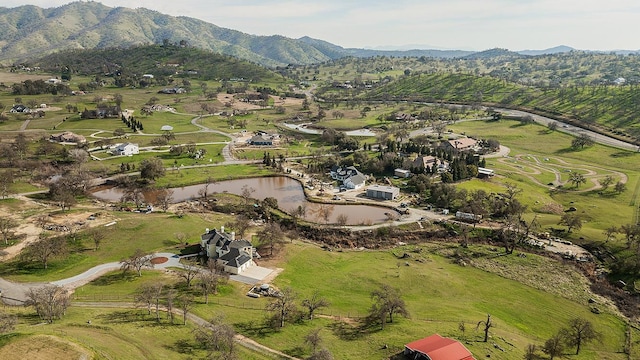 aerial view with a water and mountain view