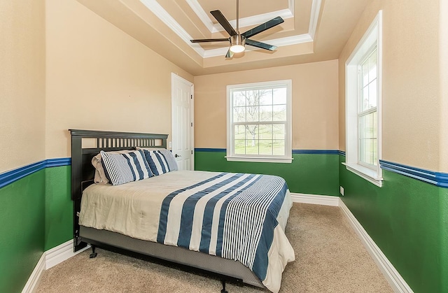 14505 Blue Drake Ln, Prather, CA 93651 - carpeted bedroom with a tray ceiling, multiple windows, ornamental molding, and ceiling fan