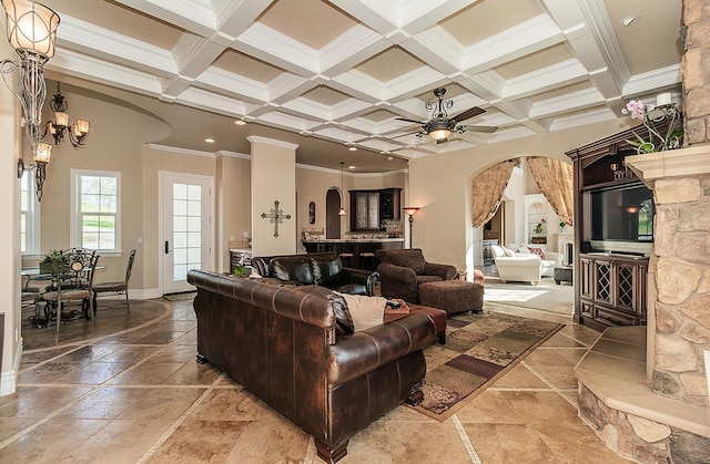 14505 Blue Drake Ln, Prather, CA 93651 - living room featuring arched walkways, ornamental molding, coffered ceiling, beam ceiling, and ceiling fan