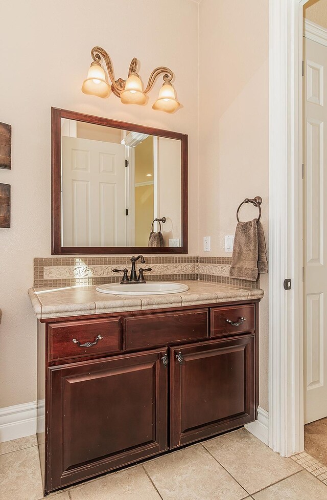 bathroom with vanity and tile patterned floors