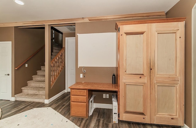 office featuring dark wood-type flooring and baseboards