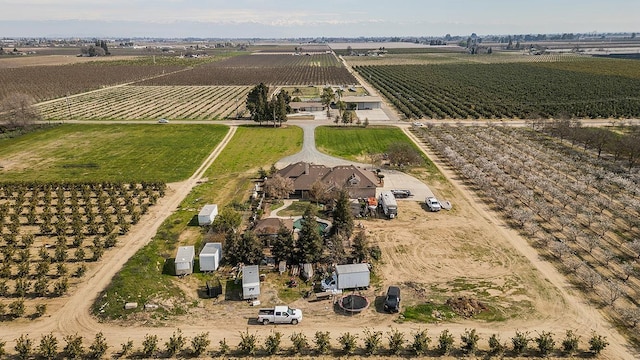 birds eye view of property featuring a rural view