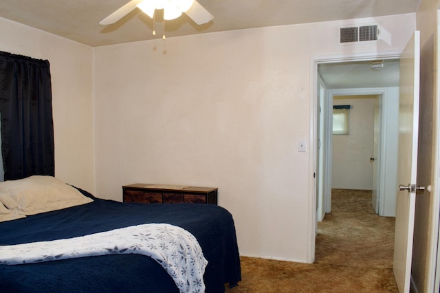 bedroom featuring carpet, visible vents, and ceiling fan