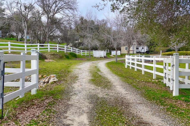 view of street featuring a rural view and driveway