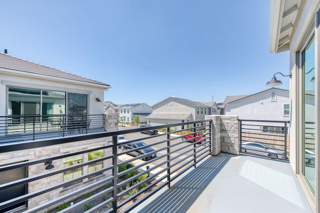 balcony featuring a residential view