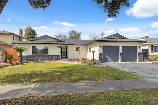 single story home with driveway, an attached garage, fence, a front lawn, and brick siding