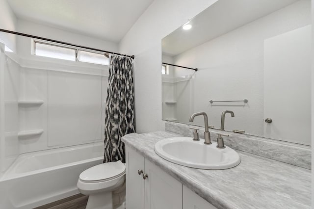 bathroom with toilet, vanity, and shower / tub combo with curtain