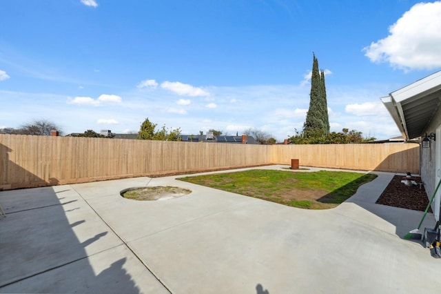 view of patio featuring a fenced backyard