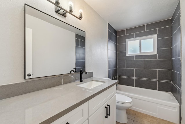 full bath with tile patterned flooring, shower / bathing tub combination, vanity, and toilet