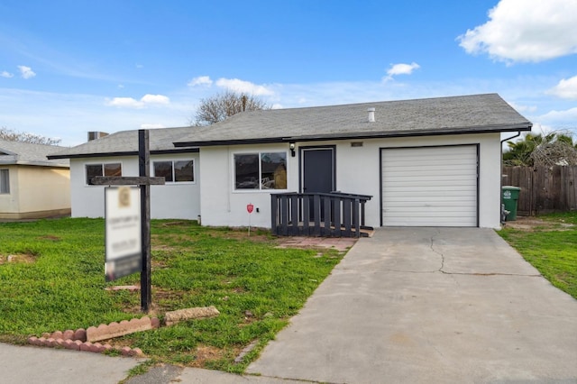 ranch-style house featuring concrete driveway, an attached garage, fence, a front lawn, and stucco siding