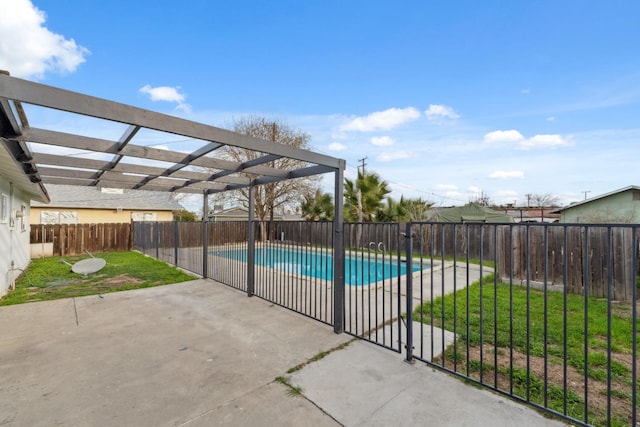 view of swimming pool featuring a fenced in pool, a patio, a lawn, a pergola, and a fenced backyard