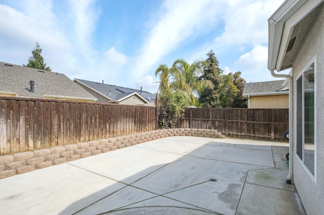 view of patio featuring a fenced backyard